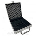 Metallic case with a black interior on a white background